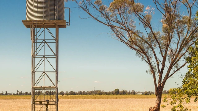 Image of water tank in a dry golden landscape